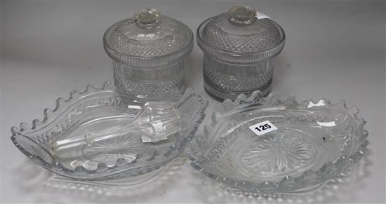A pair of Georgian cut glass navette shaped sweetmeat dishes (a.f.), a pair of honey jars and covers
